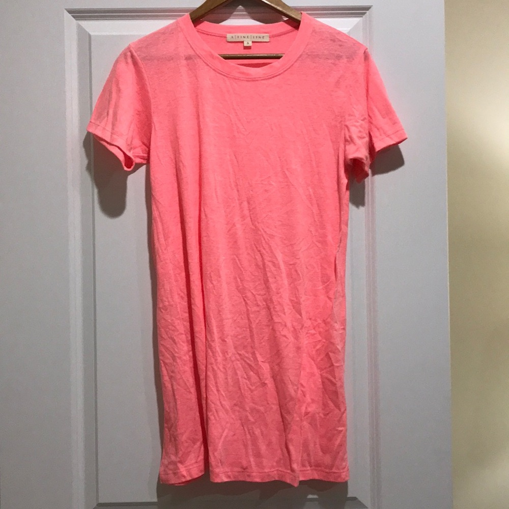 a fine line neon pink T-shirt dress